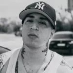 Algo Caro Lyrics  TK